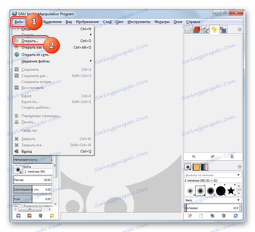 Przejdź do otwartego okna pliku, korzystając z górnego menu poziomego w programie Gimp