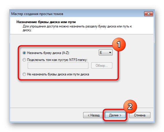 Izbira črke za novo particijo trdega diska v sistemu Windows 7